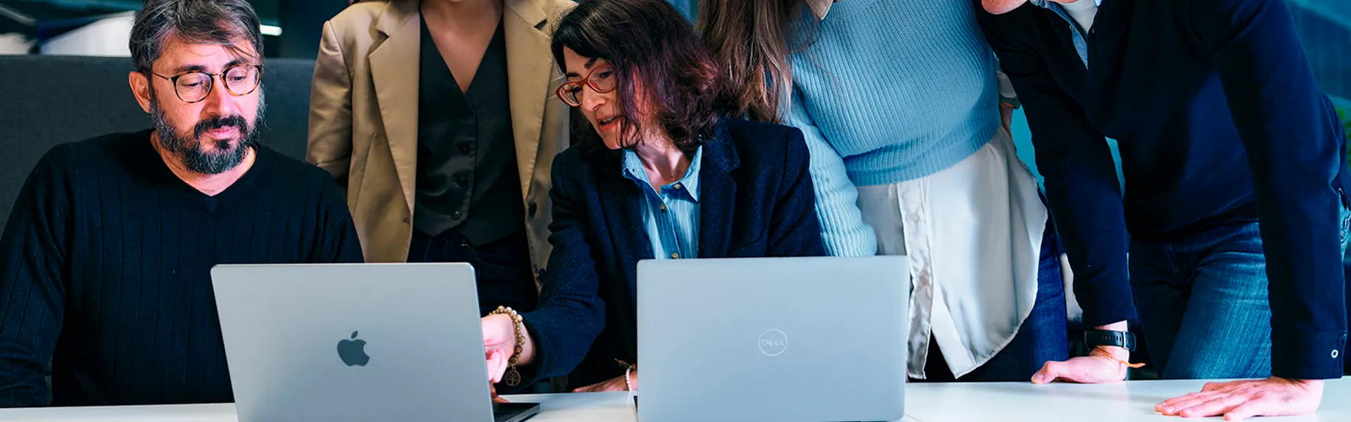 people working in the office with computers