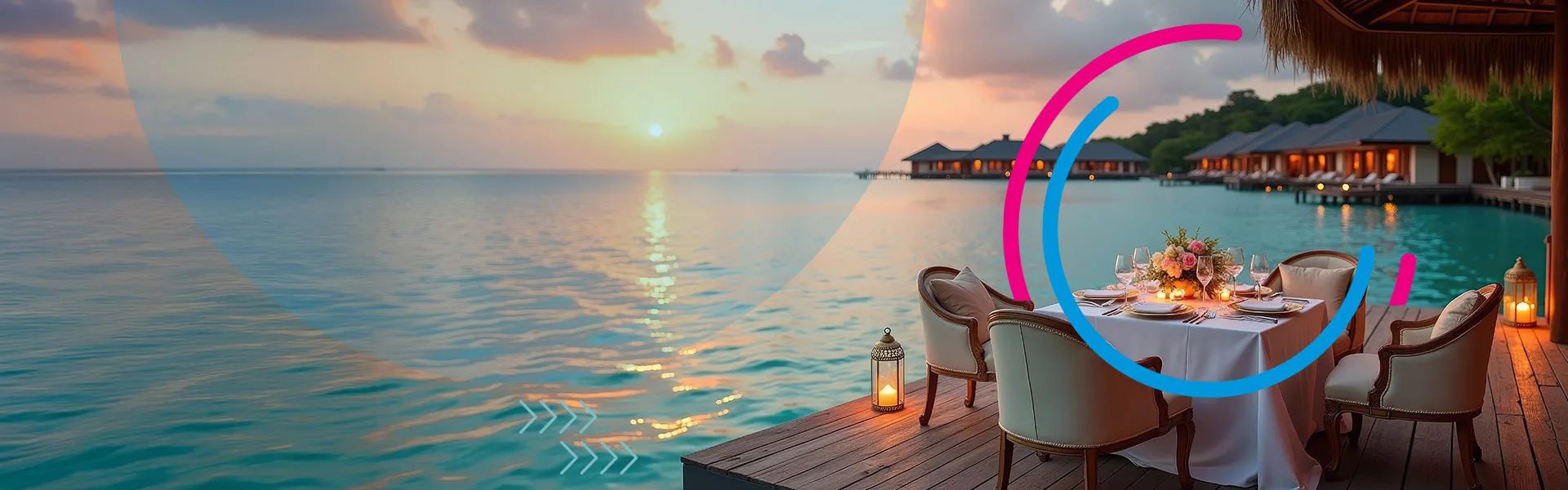 A dinner table on a wooden harbour, with the sunset and a beach as background