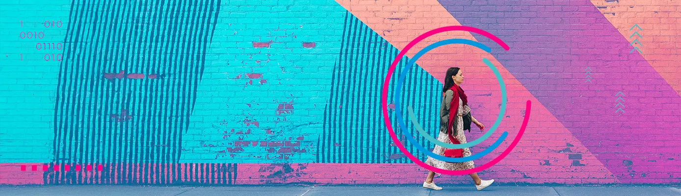 A woman walking along a brightly coloured wall, representing a creative travel hub. Used as a web header for HBX Group's Travel Trend Report 2026.
