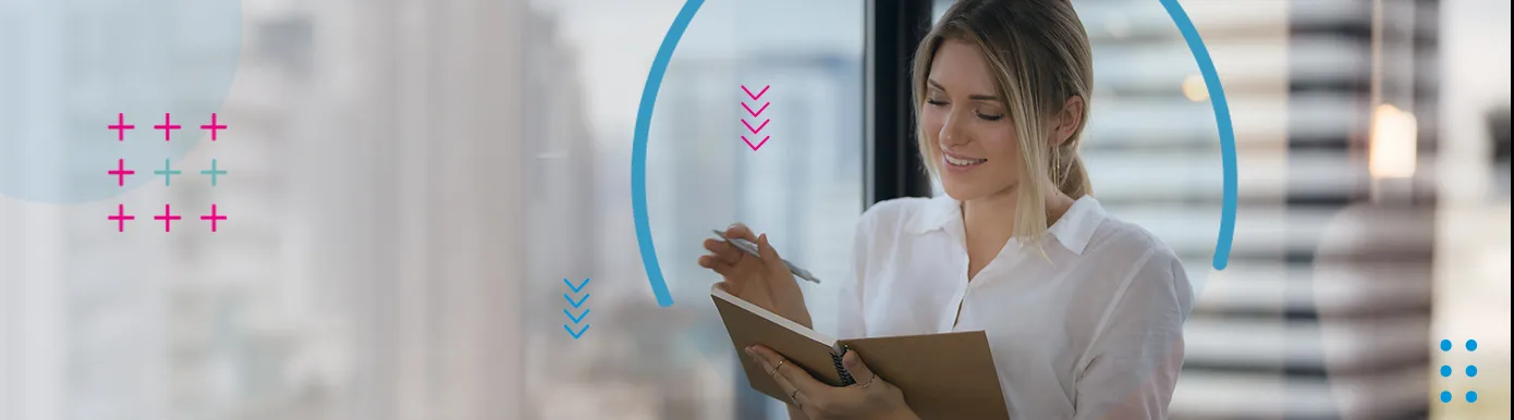 A woman making notes in an office environment