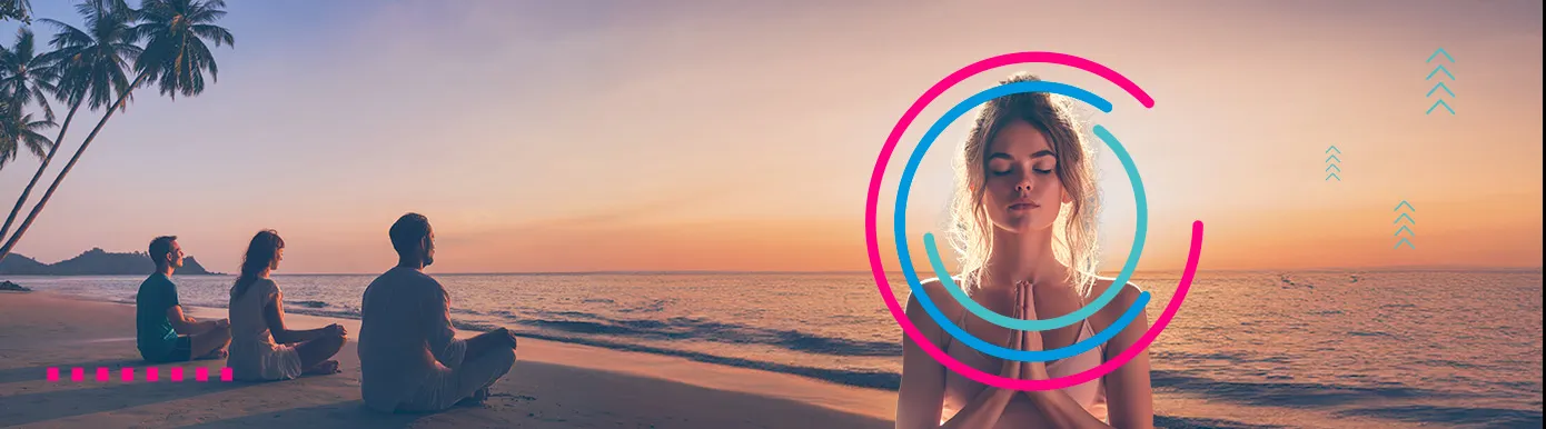 A woman and 3 others in the background meditating on a beach