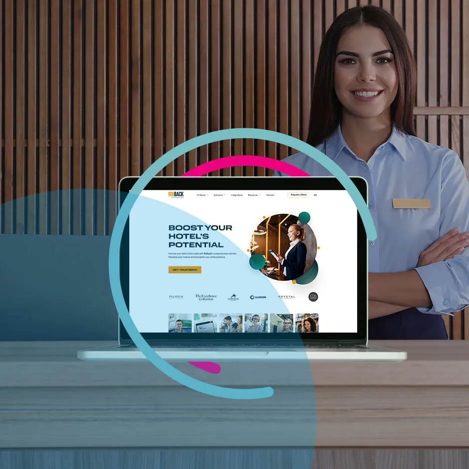 Hotel conscierge with a laptop showing Roiback's website