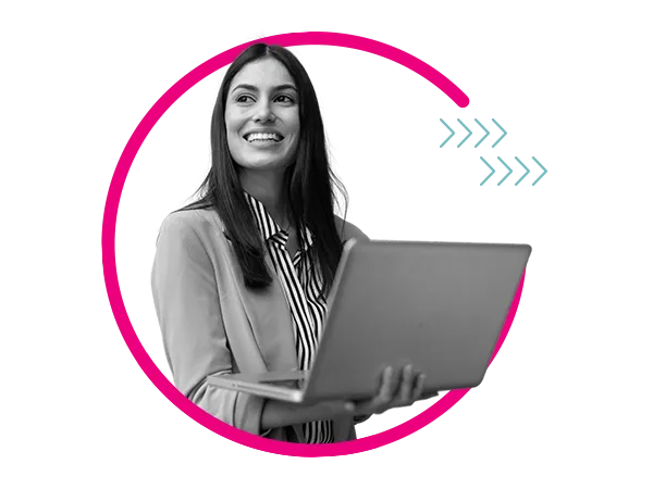 Woman in a blazer with a laptop on her hands and smiling