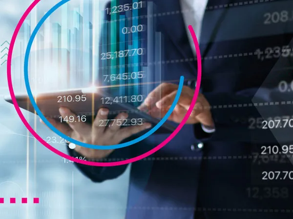 Person holding a tablet with numbers floating around it
