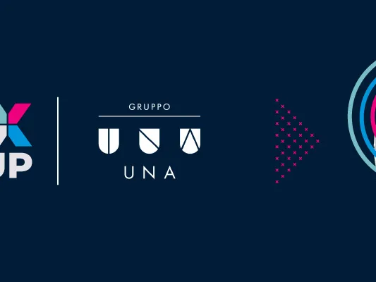 A blue background, a hotel and the text HBX GROUP/ GRUPPO UNA 