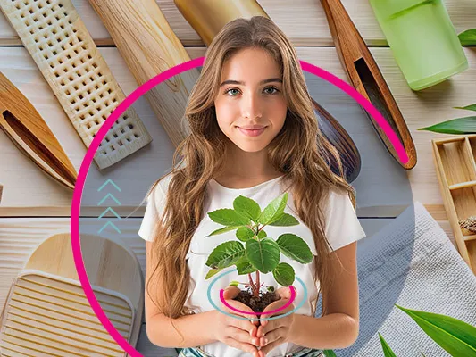 The background is a few plastic free items such as brushes and int he foreground a woman holding a plant