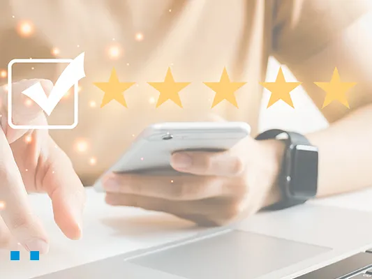 A person on the phone leaving/looking at a five star review